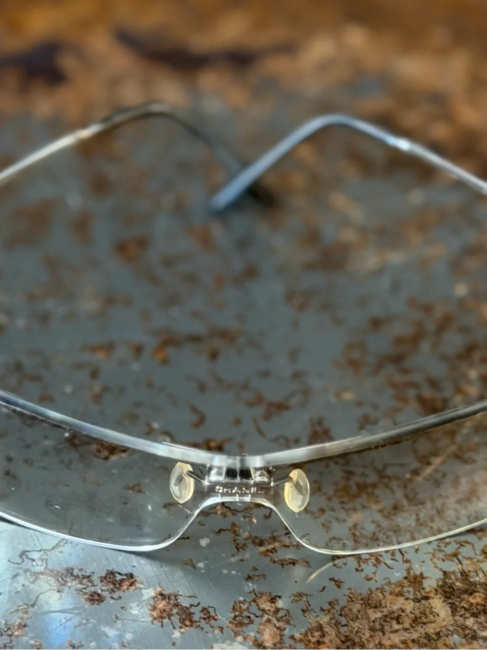 CHANEL Clear Rimless Shield Sunglasses with Silver Temples
